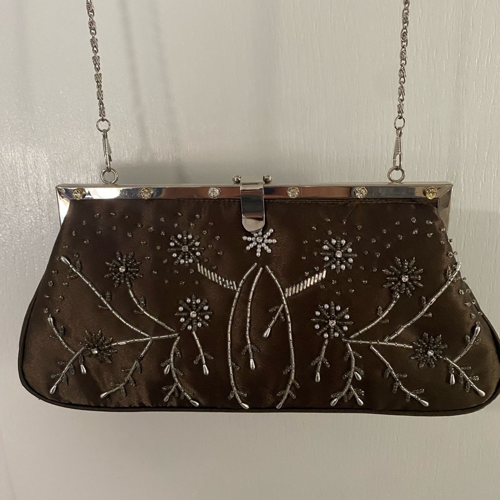Elegant Brown Embroidered Clutch with detachable chain shoulder strap.